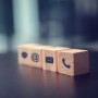 contact-us-concept-wood-block-symbol-telephone-mail-address-desk.jpg